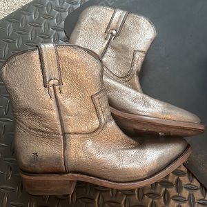 NWOT bronzed Frye boots.
